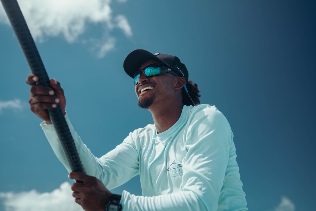 A Belizian Guide wearing polarized sunglasses