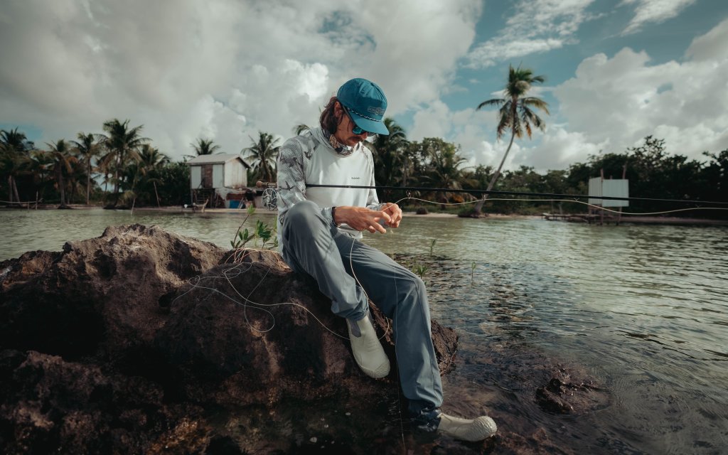 preparing a fly rod for some permit fishing in Belize 